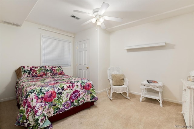 bedroom featuring light colored carpet, ceiling fan, and baseboards
