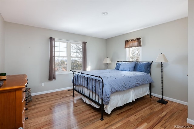 bedroom featuring hardwood / wood-style flooring