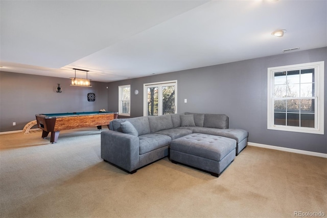 living room with light colored carpet and pool table