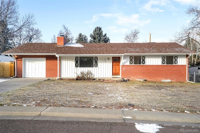 single story home featuring a garage