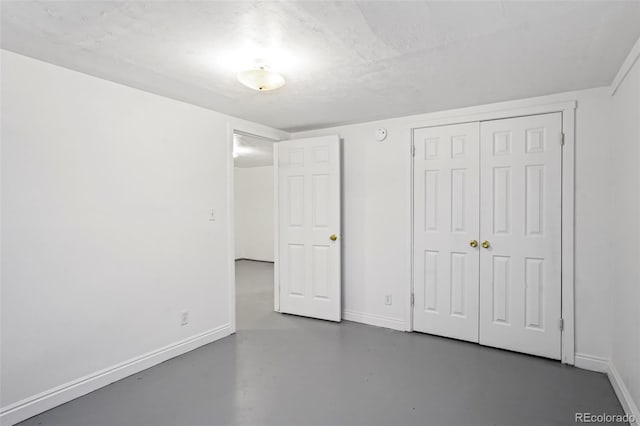 unfurnished bedroom with a textured ceiling