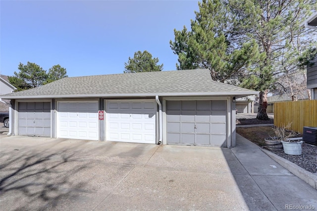 garage featuring fence