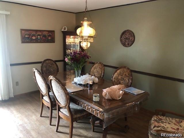 dining room featuring wood-type flooring