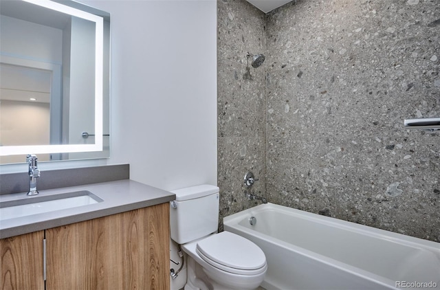 full bathroom featuring toilet,  shower combination, and vanity