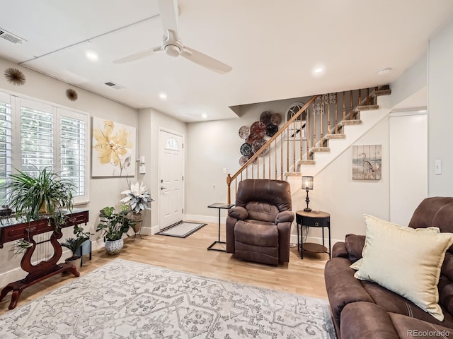 5525 S Lowell Blvd, Littleton, CO 80123 - living area featuring stairs, wood finished floors, ceiling fan, and recessed lighting