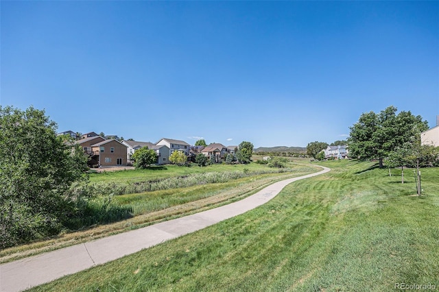 6774 S Independence St, Littleton, CO 80128 - surrounding community featuring a residential view and a yard