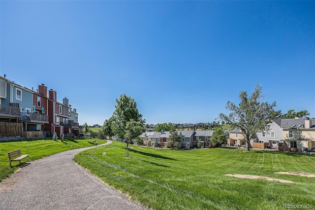 6774 S Independence St, Littleton, CO 80128 - view of home's community with a residential view and a yard