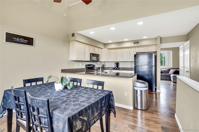1099 S Walden Way Unit 205, Aurora, CO 80017 - dining space with a ceiling fan, light wood-type flooring, and recessed lighting