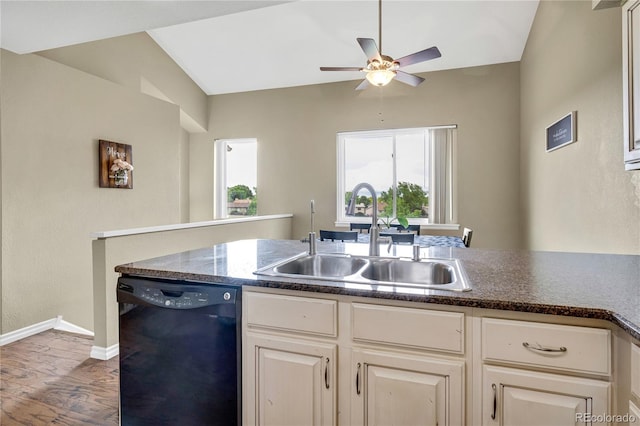 1099 S Walden Way Unit 205, Aurora, CO 80017 - kitchen featuring black dishwasher, a ceiling fan, wood finished floors, and dark countertops