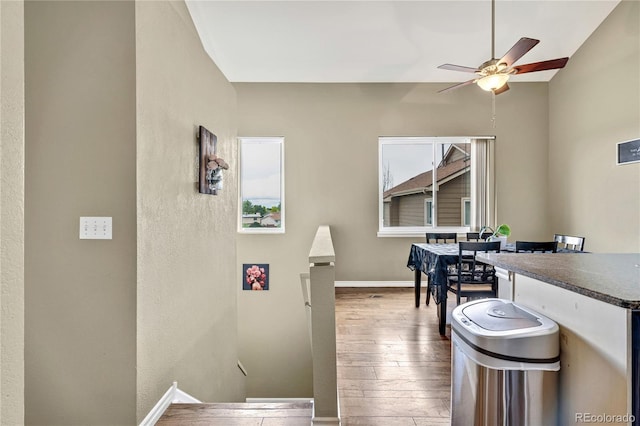 1099 S Walden Way Unit 205, Aurora, CO 80017 - dining area with wood-type flooring and a ceiling fan