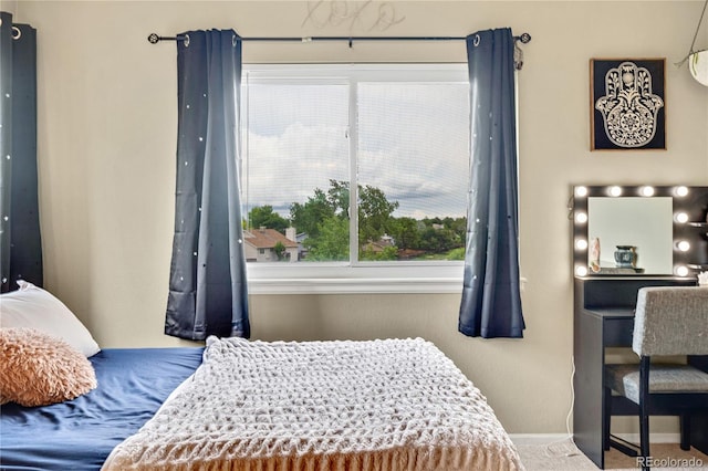 1099 S Walden Way Unit 205, Aurora, CO 80017 - carpeted bedroom featuring baseboards