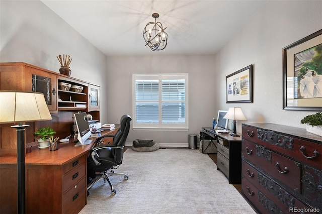 carpeted office featuring baseboards and an inviting chandelier