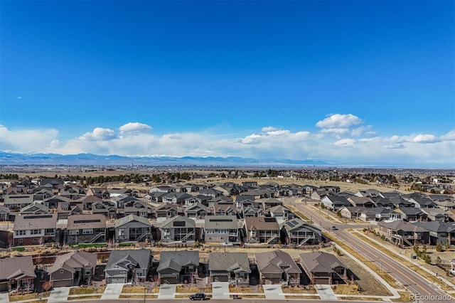 bird's eye view featuring a residential view and a mountain view