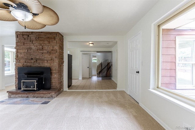 5810 S Greenwood St, Littleton, CO 80120 - unfurnished living room with carpet, a ceiling fan, and healthy amount of natural light