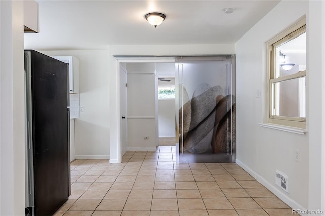 5810 S Greenwood St, Littleton, CO 80120 - foyer entrance featuring baseboards and light tile patterned floors