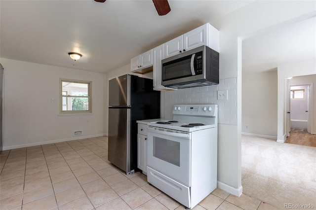 5810 S Greenwood St, Littleton, CO 80120 - kitchen featuring appliances with stainless steel finishes, plenty of natural light, white cabinetry, and a ceiling fan