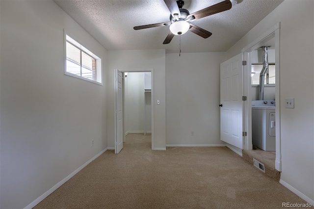5810 S Greenwood St, Littleton, CO 80120 - unfurnished bedroom featuring washer / clothes dryer, a textured ceiling, a spacious closet, light carpet, and ceiling fan