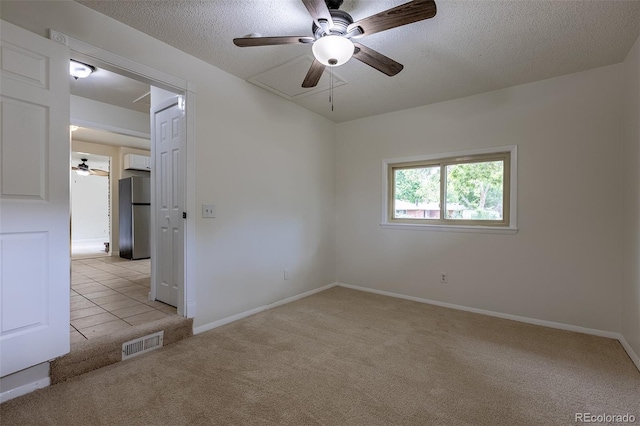 5810 S Greenwood St, Littleton, CO 80120 - empty room featuring ceiling fan, light carpet, baseboards, and a textured ceiling
