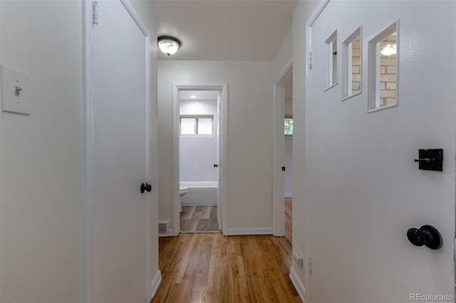 5810 S Greenwood St, Littleton, CO 80120 - hall featuring wood finished floors and baseboards