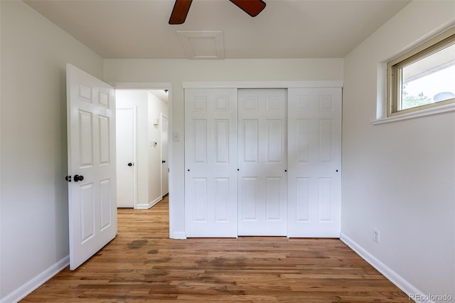 5810 S Greenwood St, Littleton, CO 80120 - unfurnished bedroom with attic access, wood finished floors, baseboards, a closet, and ceiling fan