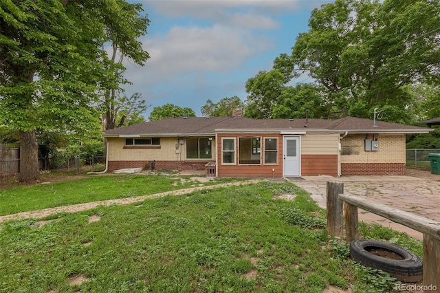 5810 S Greenwood St, Littleton, CO 80120 - back of property with brick siding and a chimney
