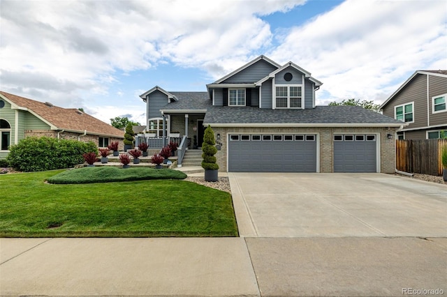 6888 Howell St, Arvada, CO 80004 - tri-level home featuring brick siding, driveway, a garage, and a porch
