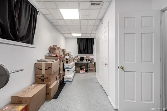 6888 Howell St, Arvada, CO 80004 - hallway featuring a drop ceiling