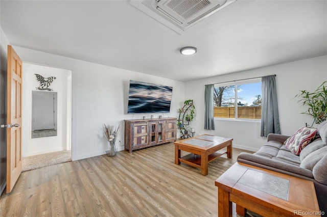 living room with light hardwood / wood-style floors