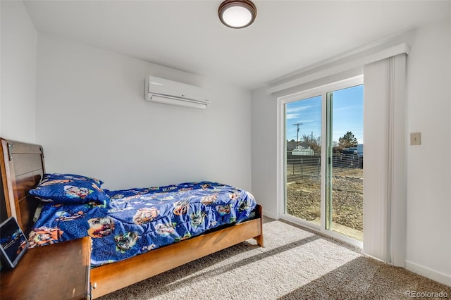 carpeted bedroom featuring a wall mounted AC