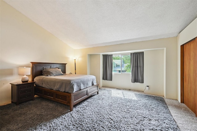10525 Hobbit Ln, Westminster, CO 80031 - carpeted bedroom featuring a textured ceiling and vaulted ceiling