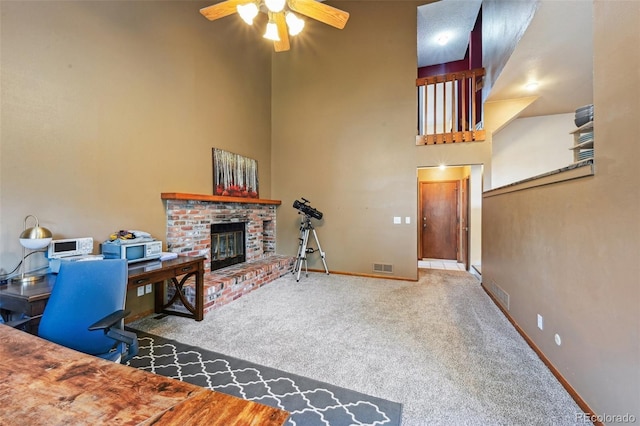 10525 Hobbit Ln, Westminster, CO 80031 - carpeted living room featuring a ceiling fan, a high ceiling, and a fireplace