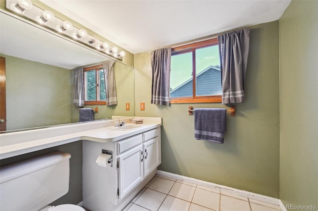 10525 Hobbit Ln, Westminster, CO 80031 - half bathroom featuring vanity and tile patterned floors
