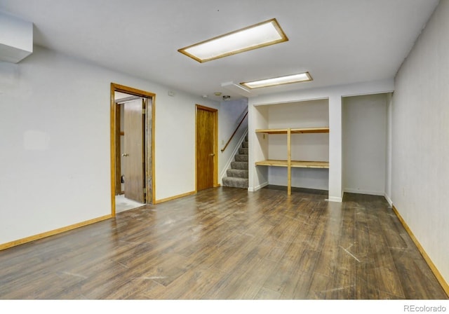 10525 Hobbit Ln, Westminster, CO 80031 - below grade area featuring wood finished floors and stairway