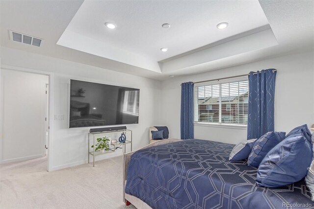 17825 Gallup St, Broomfield, CO 80023 - carpeted bedroom featuring a tray ceiling, baseboards, and recessed lighting