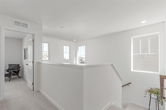 17825 Gallup St, Broomfield, CO 80023 - hall featuring an upstairs landing, light colored carpet, baseboards, and recessed lighting