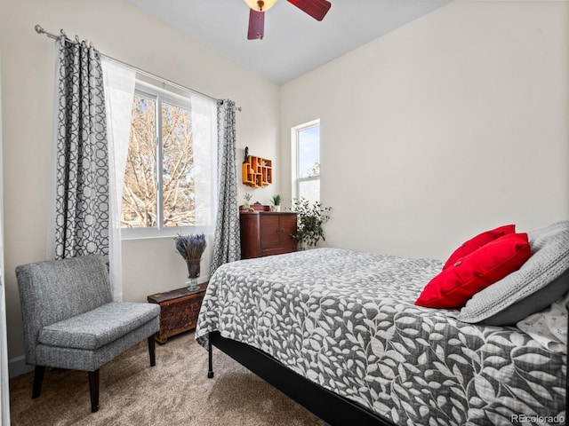 carpeted bedroom with ceiling fan