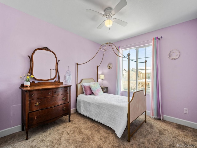 bedroom featuring light carpet and ceiling fan