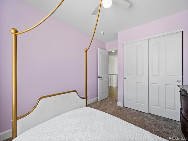 carpeted bedroom featuring ceiling fan and a closet