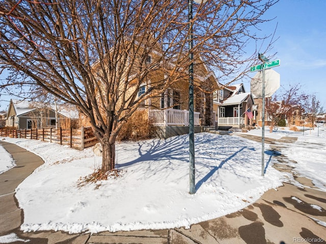 view of yard covered in snow