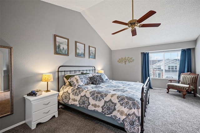 bedroom with baseboards, dark carpet, vaulted ceiling, and a textured ceiling