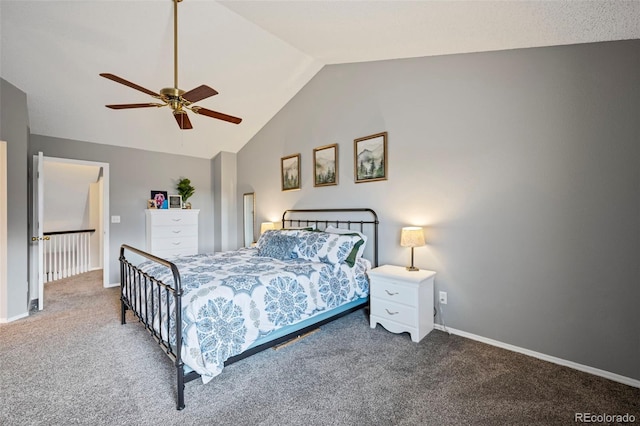 carpeted bedroom featuring vaulted ceiling, baseboards, and ceiling fan