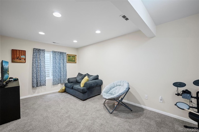 living area with recessed lighting, carpet, and baseboards