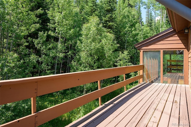 2246 Gcr 8, Fraser, CO 80442 - wooden deck featuring a forest view