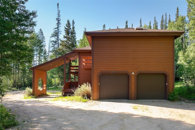 2246 Gcr 8, Fraser, CO 80442 - view of front of property with a garage and driveway