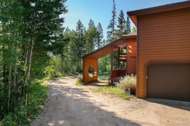2246 Gcr 8, Fraser, CO 80442 - view of property exterior featuring driveway and a garage