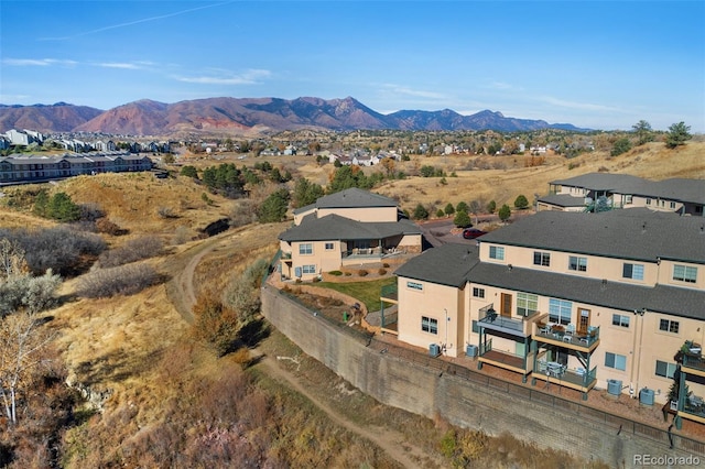 birds eye view of property featuring a mountain view