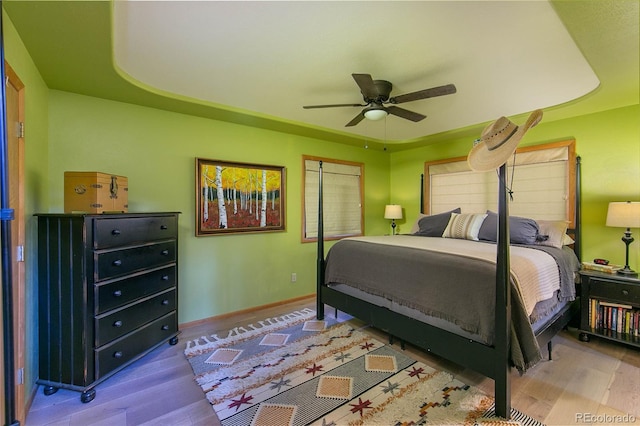 426 S San Juan Ave, Buena Vista, CO 81211 - bedroom with wood finished floors, baseboards, and ceiling fan