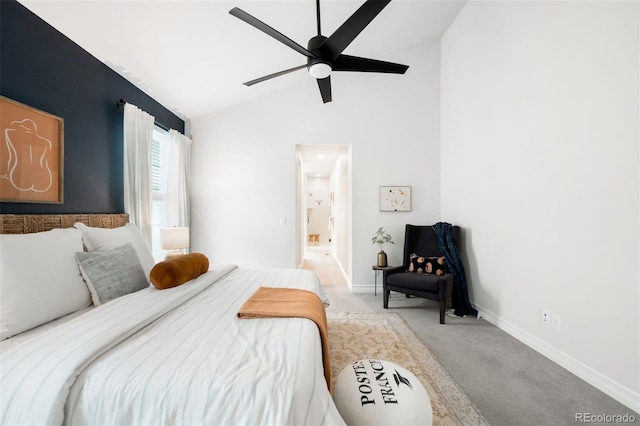 3320 Yukon Ct, Wheat Ridge, CO 80033 - bedroom featuring carpet flooring, vaulted ceiling, baseboards, connected bathroom, and ceiling fan