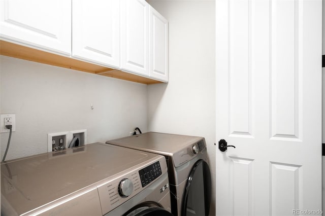 3320 Yukon Ct, Wheat Ridge, CO 80033 - laundry area featuring cabinet space and washer and clothes dryer