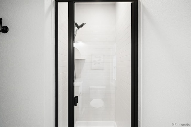 3320 Yukon Ct, Wheat Ridge, CO 80033 - bathroom view of a shower stall and a textured wall